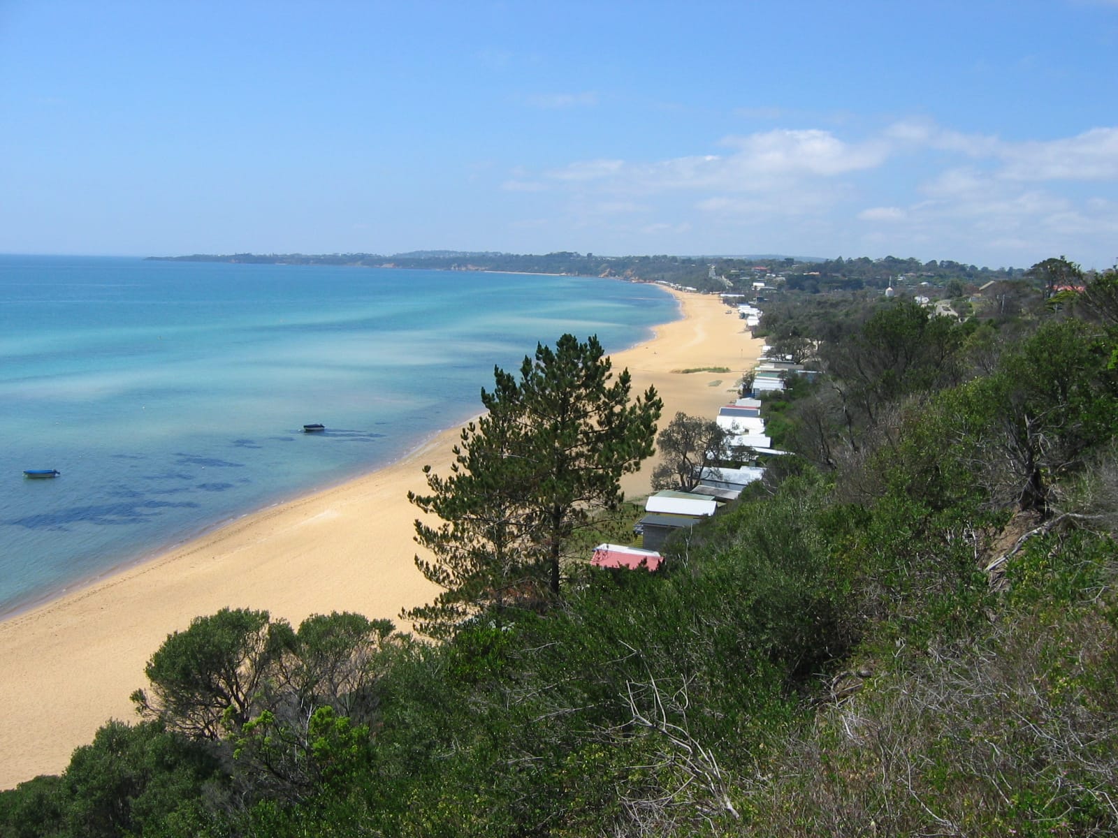 Mount Martha Beach and its bathing boxes looking north-east across Port Phillip Bay