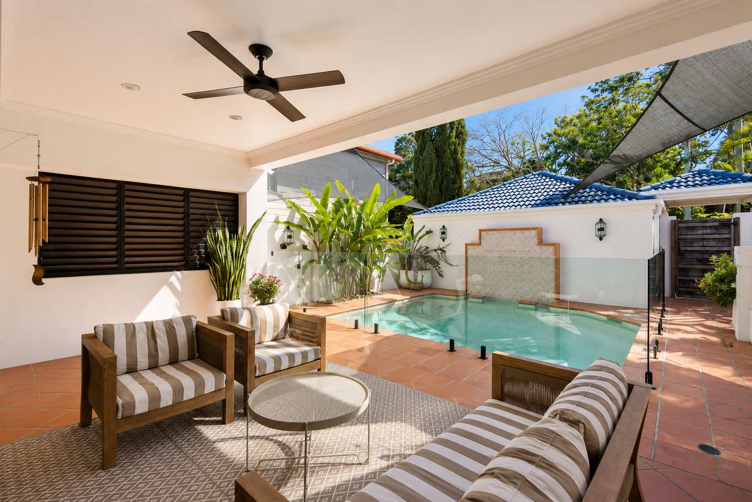 The covered terrace beside the pool at The Beachside House, Burleigh Heads