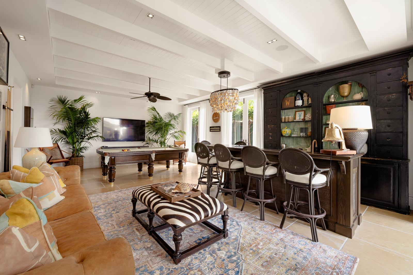 Recreation room with pool table and bar