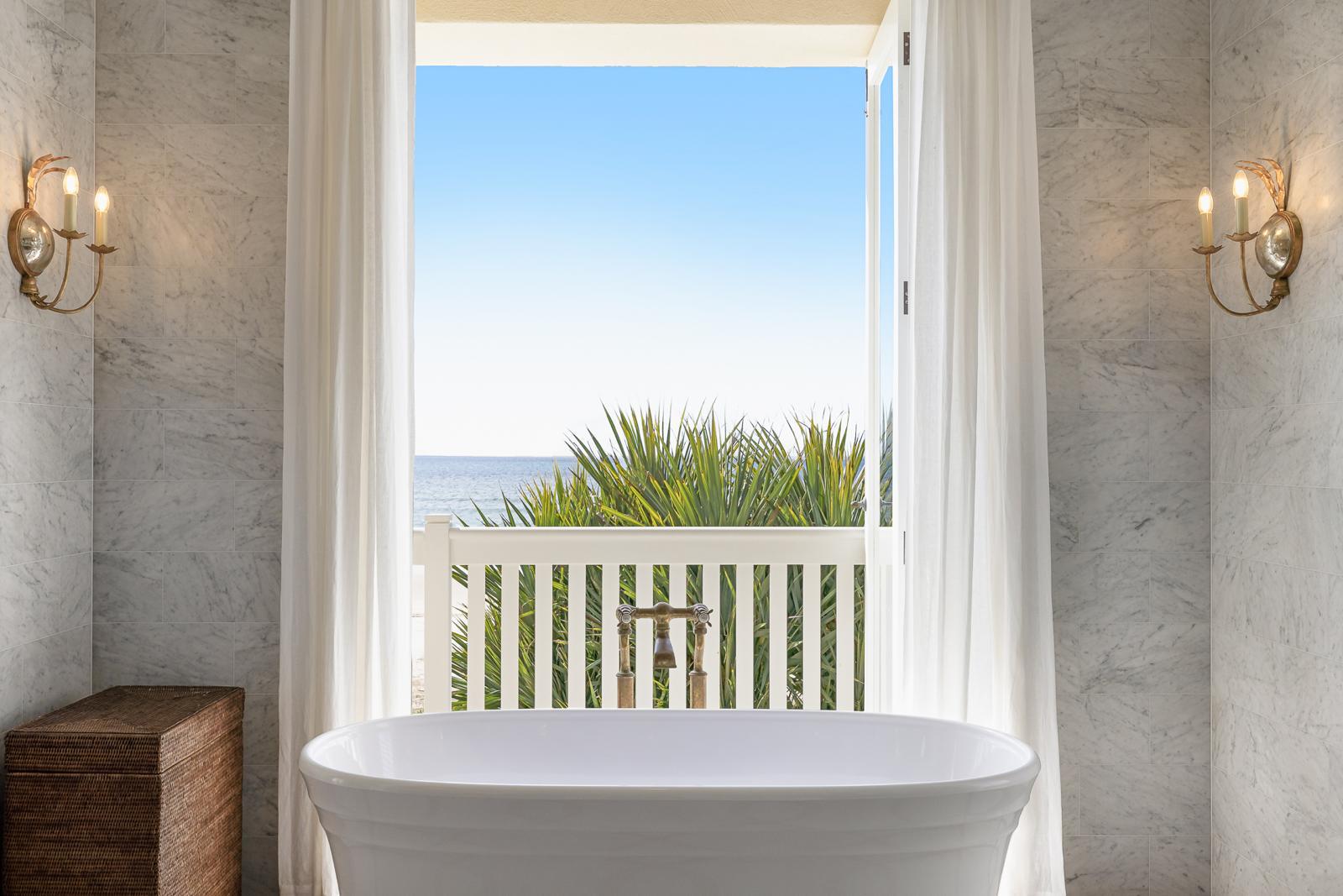 Freestanding bath looking out to the ocean